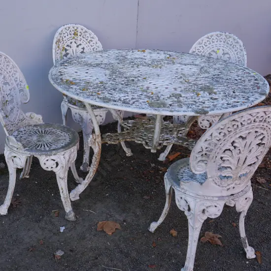 White metal outdoor setting - table and 4 chairs