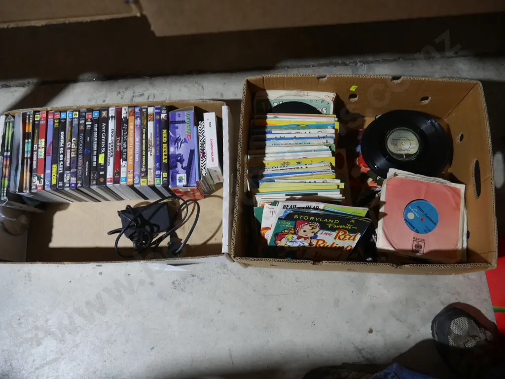 2 boxes of DVDs and 45s Image 1++