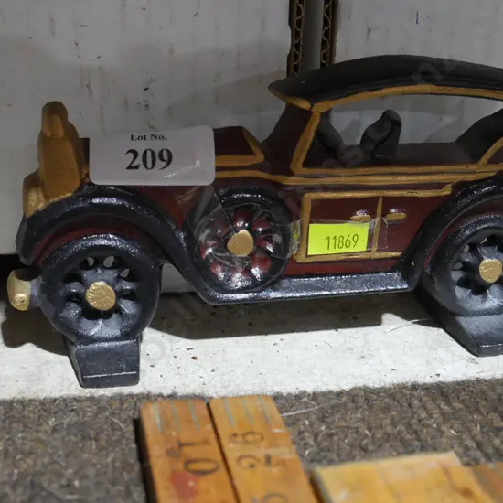 Cast car door stop