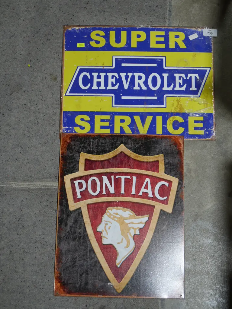 Two tin signs Image 1++