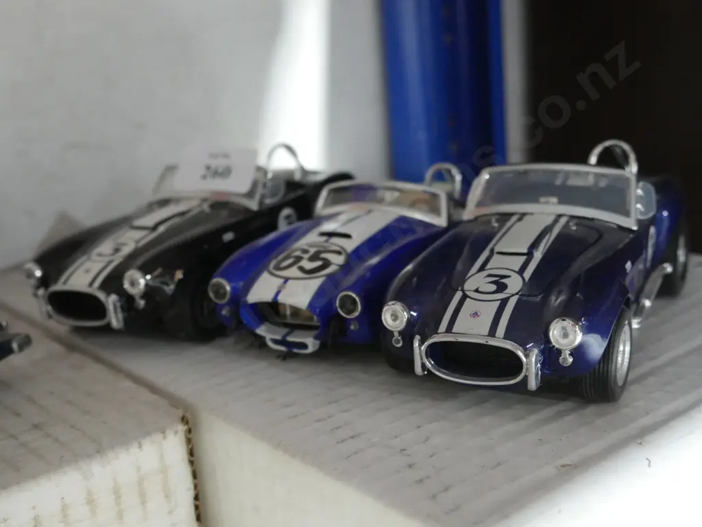 Three model race cars Image 1++