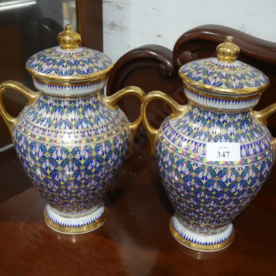 Two lidded urns