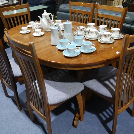Extendable dining table and six chairs