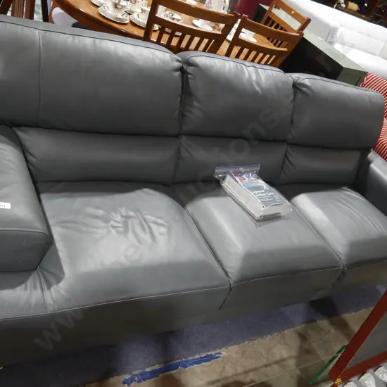 Three seater leather settee