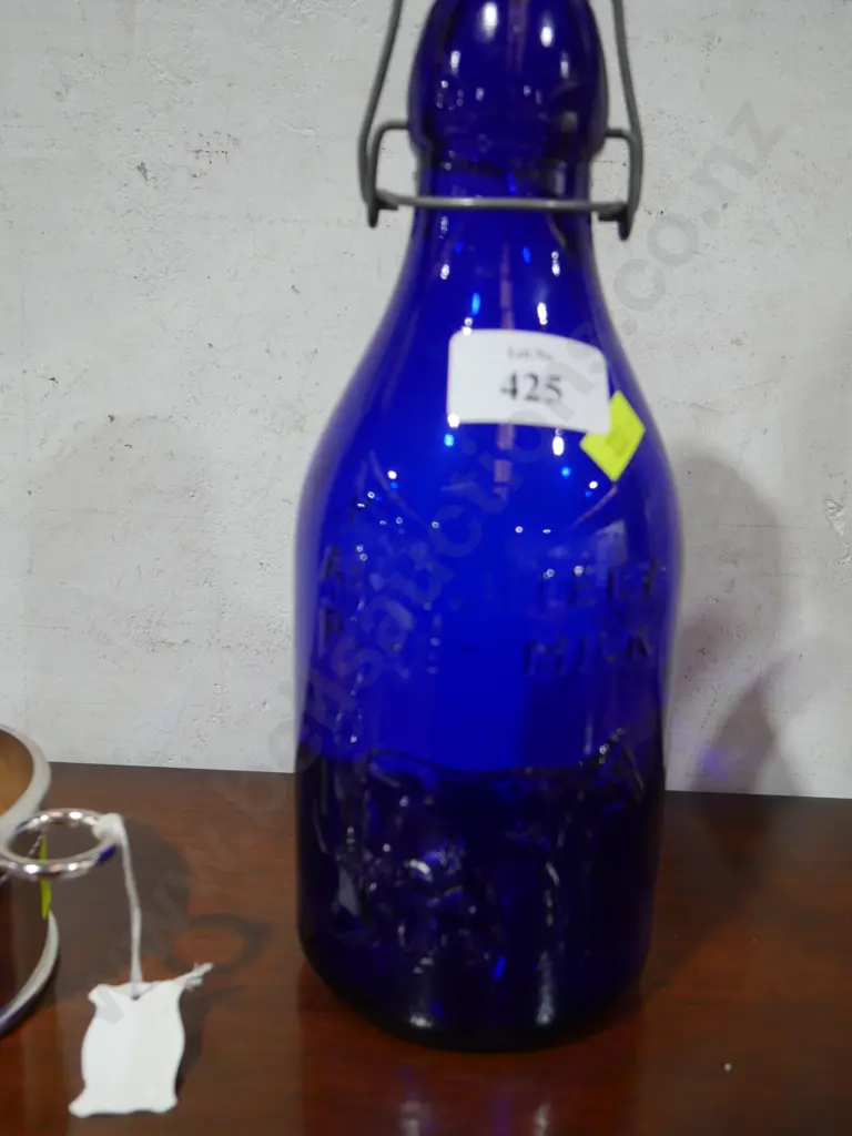 Blue glass milk bottle Image 1++