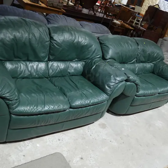 2 x 2 seater green leather sofas