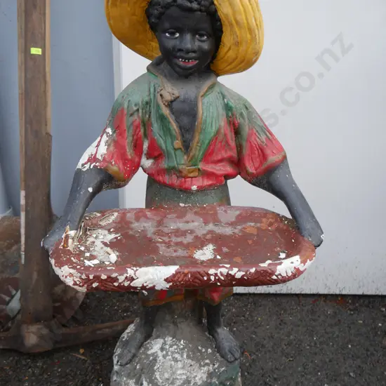 Fruit selling boy statue