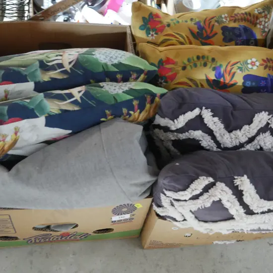 Two boxes of cushions etc