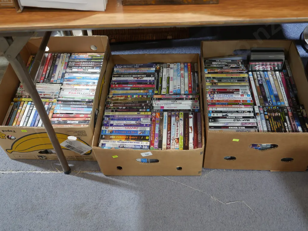 Three boxes of DVDs Image 1++