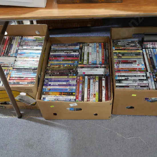 Three boxes of DVDs