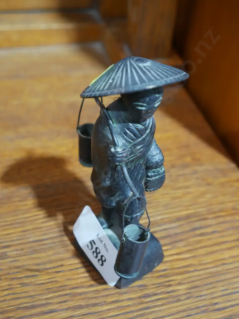 Oriental water carrier figurine Image 1++