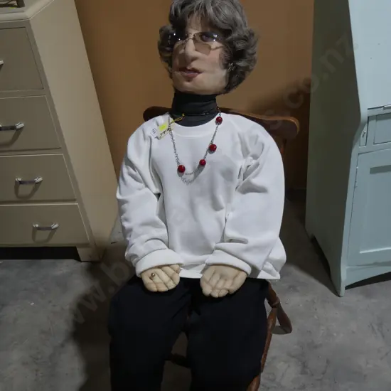Mildred figure on chair