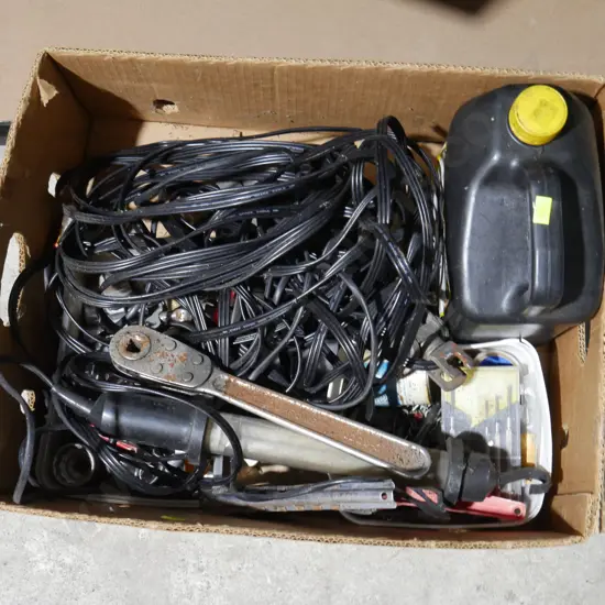 Box of cables, tools, lubricant