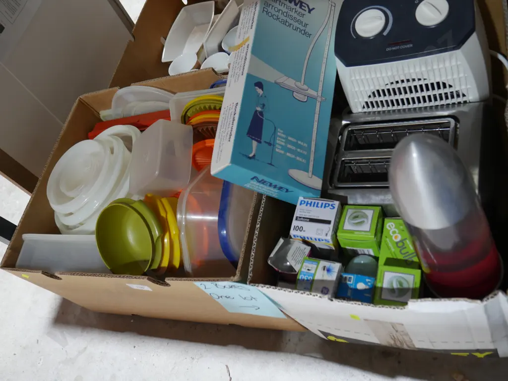 2boxes of Tupperware, light bulbs, toaster etc Image 1++