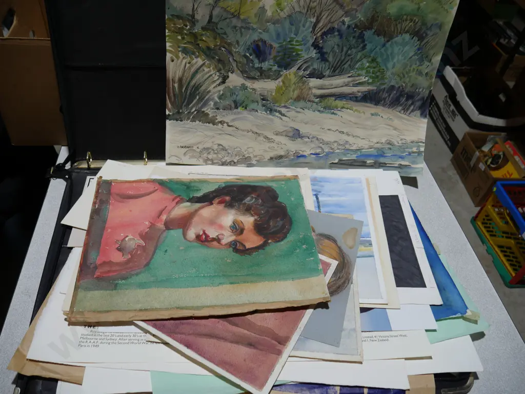 Assorted unframed artworks Image 1++