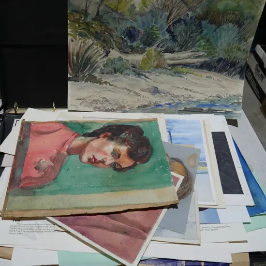 Assorted unframed artworks