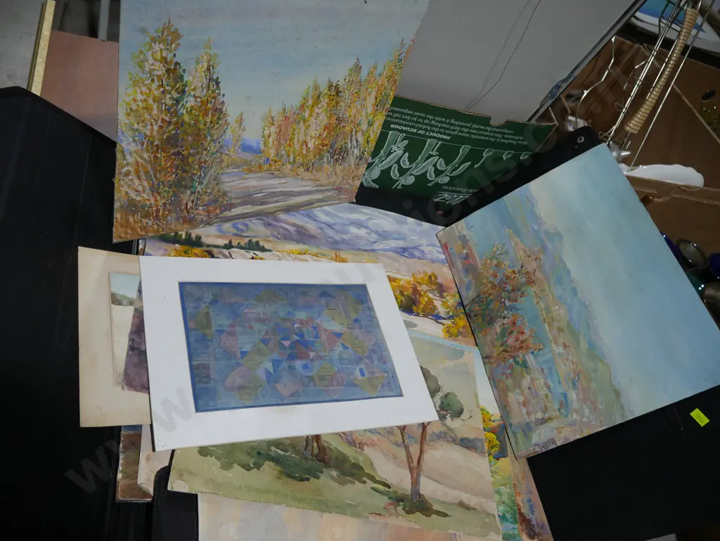Assorted unframed artworks Image 1++