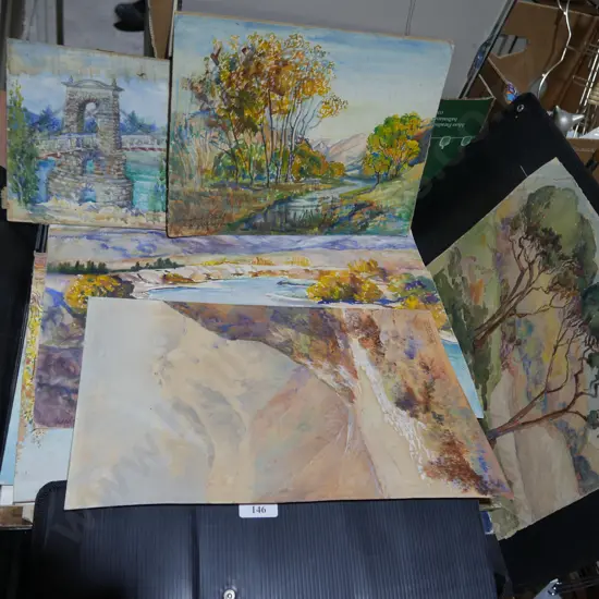 Assorted unframed artworks