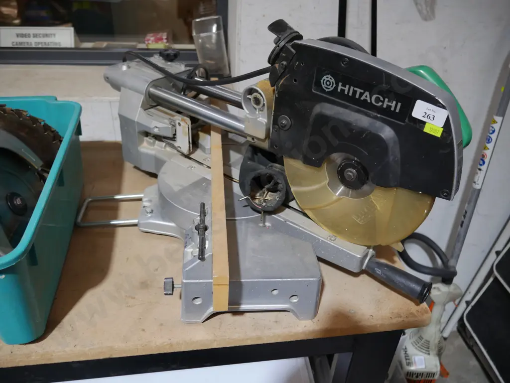 Hitachi drop saw Image 1++