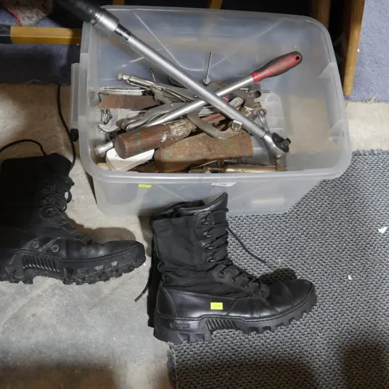 Assorted tools and work boots