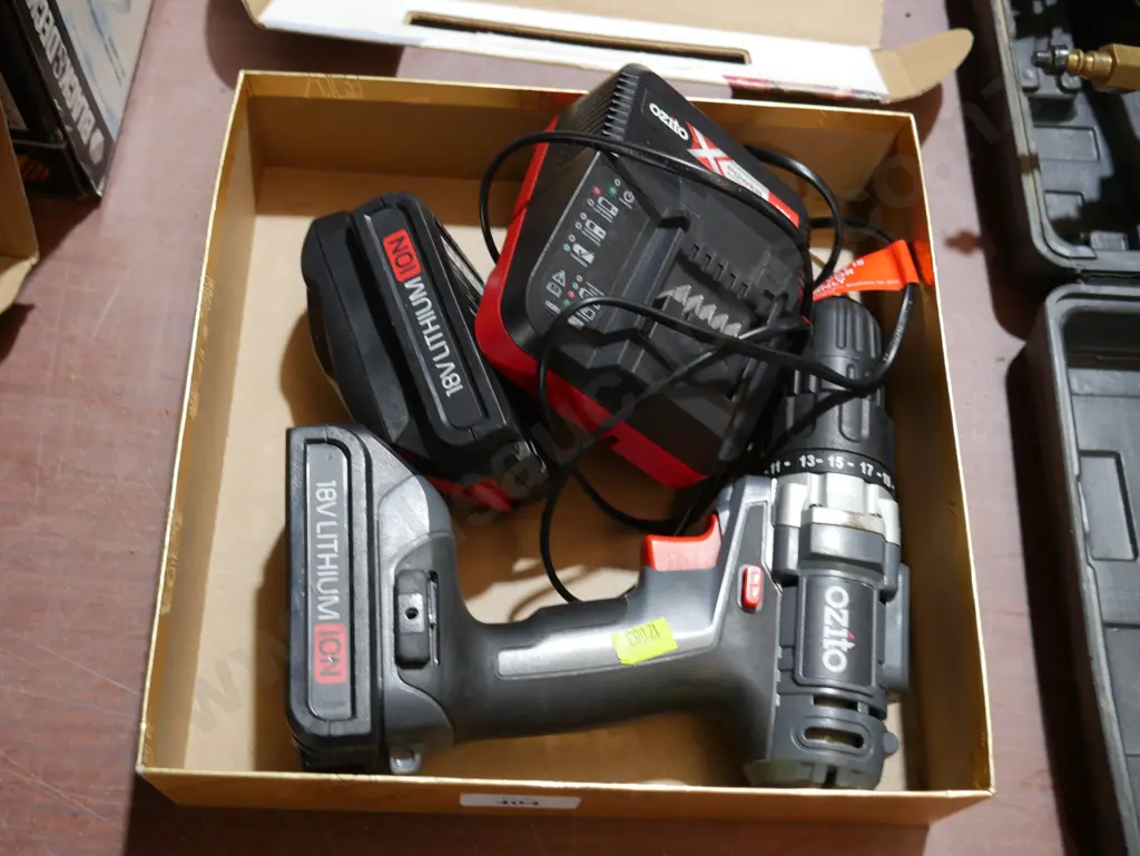 Ozito drill and battery charger Image 1++