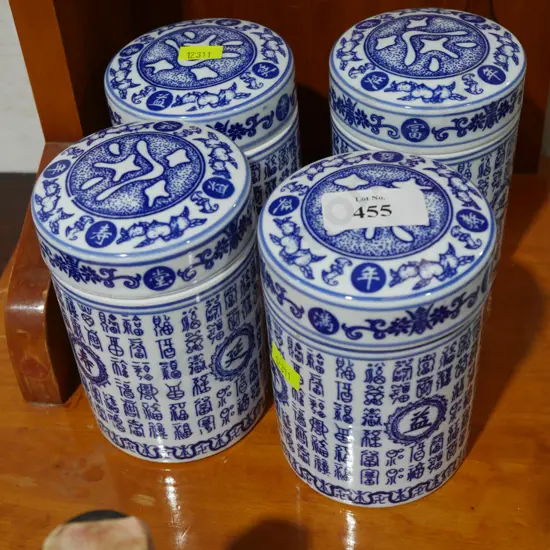 Set of 4 blue and white lidded jars