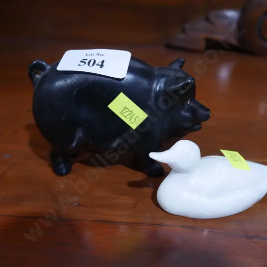 Pig and duck figurines