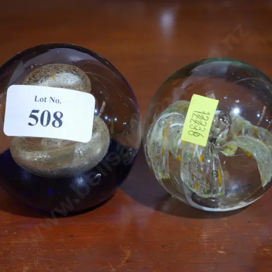 2 glass paper weights