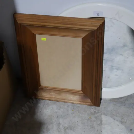 Picture frame and round wall mirror