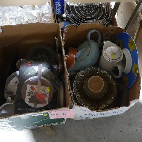 The two boxes of kitchenware