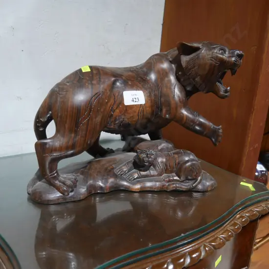 Carved big cat ornament