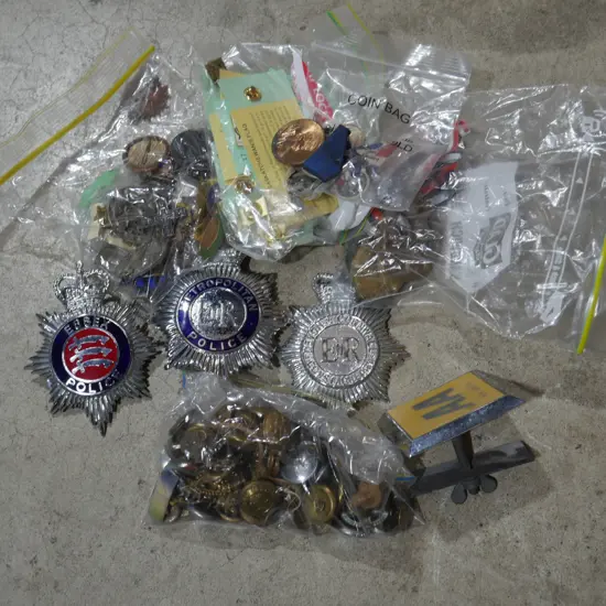 Assorted badges and buttons