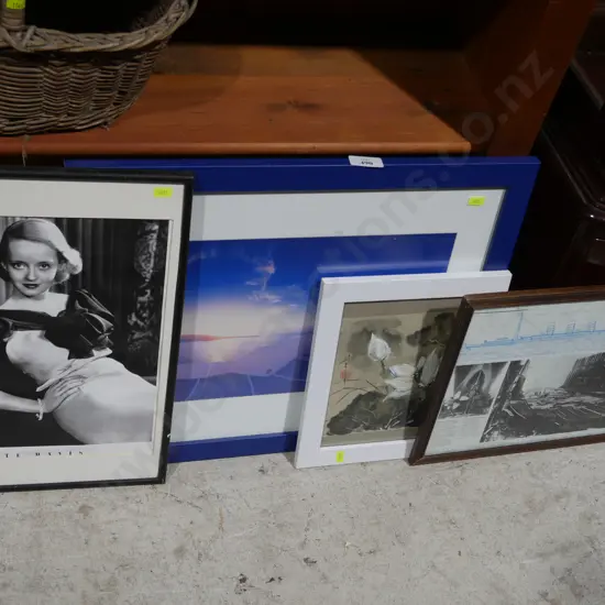 Framed artworks and photographs