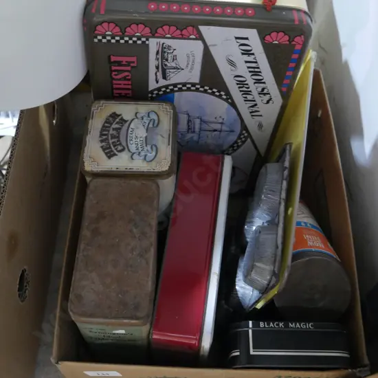 Assorted tins