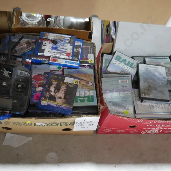 Two boxes of DVDs