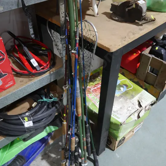 Assorted fishing rods and net