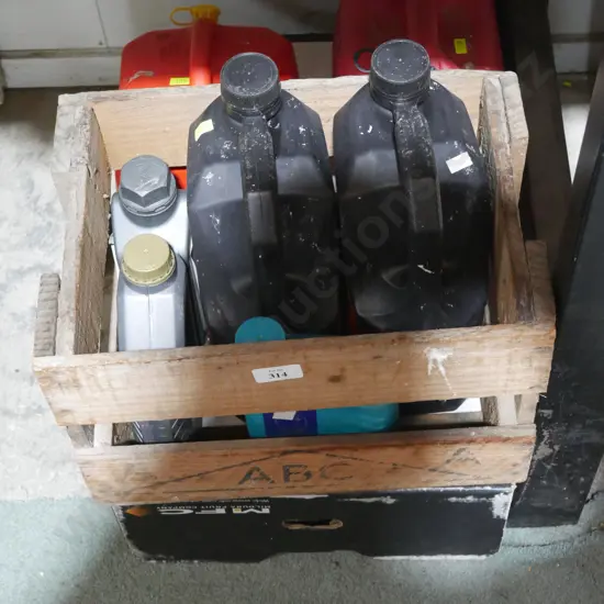 Assorted oils and petrol cans