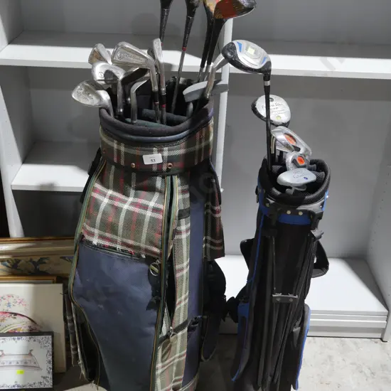 2 golf bags and clubs