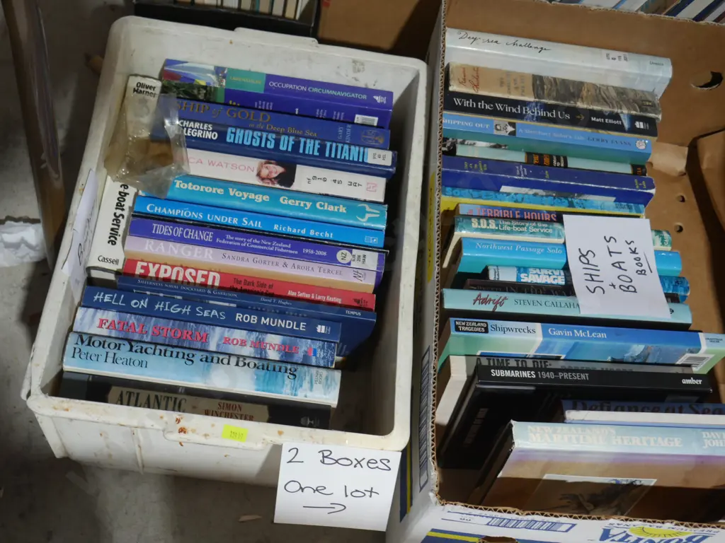 2 boxes of boat books Image 1++