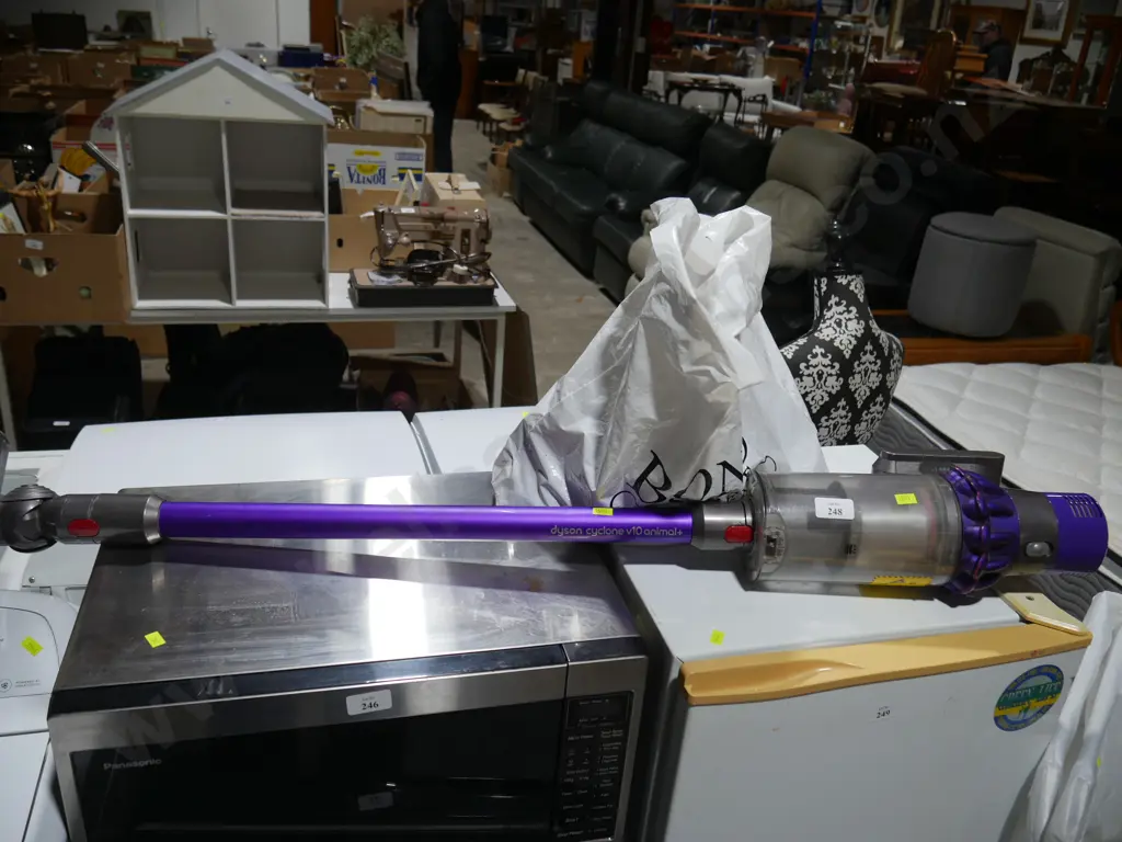 Dyson V10 animal plus stick vac Image 1++