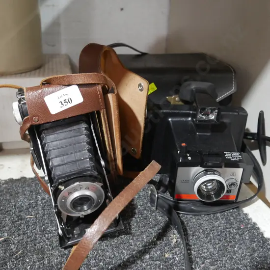 Polaroid camera etc