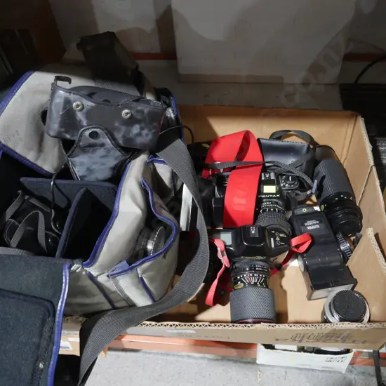 Assorted cameras and lenses