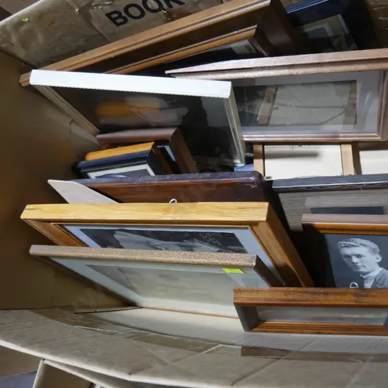 Box of framed pictures