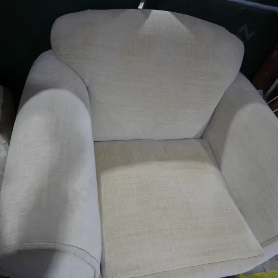 Rolled arm armchair