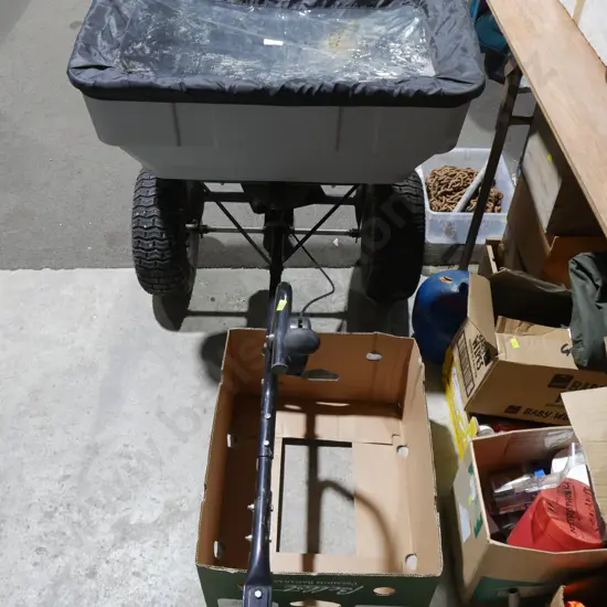 Tow behind fertilizer spreader