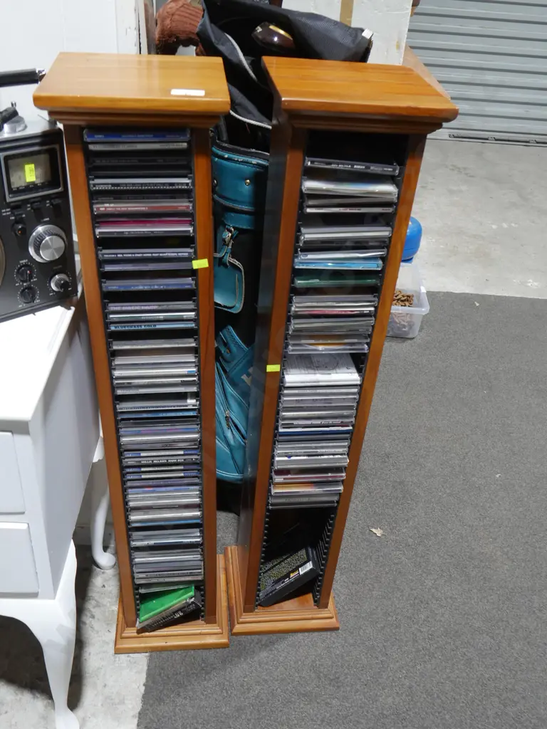 Pair of CD towers, and CDs Image 1++