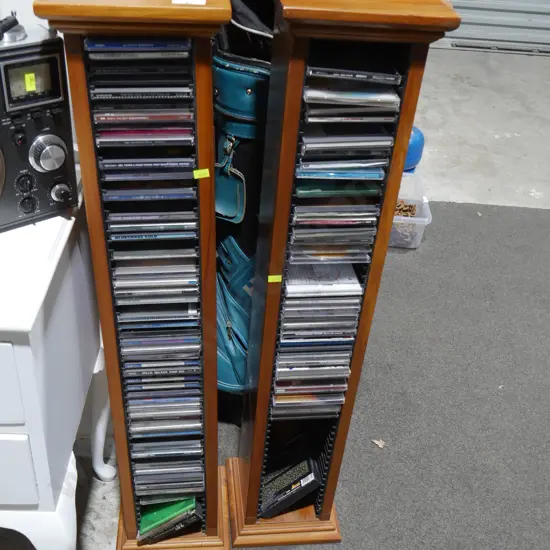 Pair of CD towers, and CDs