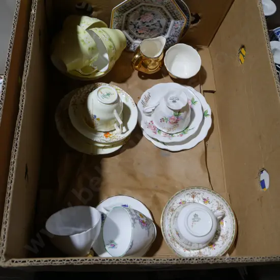 Assorted cups and saucers