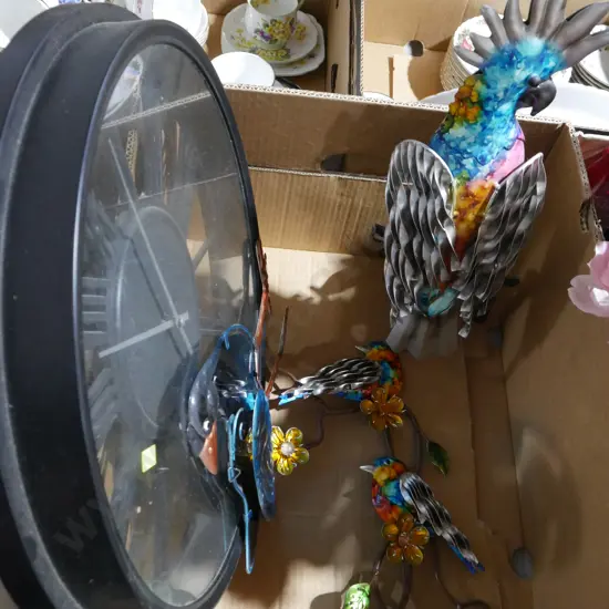 Clock, metal birds