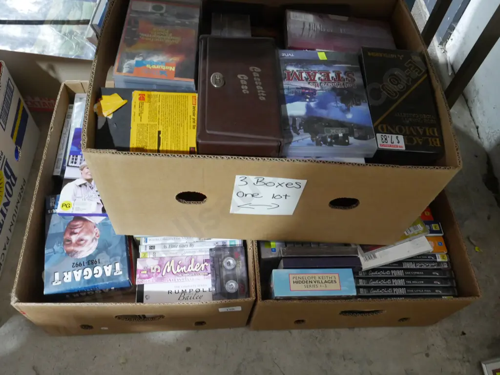 Three boxes of DVDs Image 1++